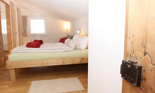 Schlafzimmer 1 im Appartement De Luxe Mona - Elbigenalp, Grünau